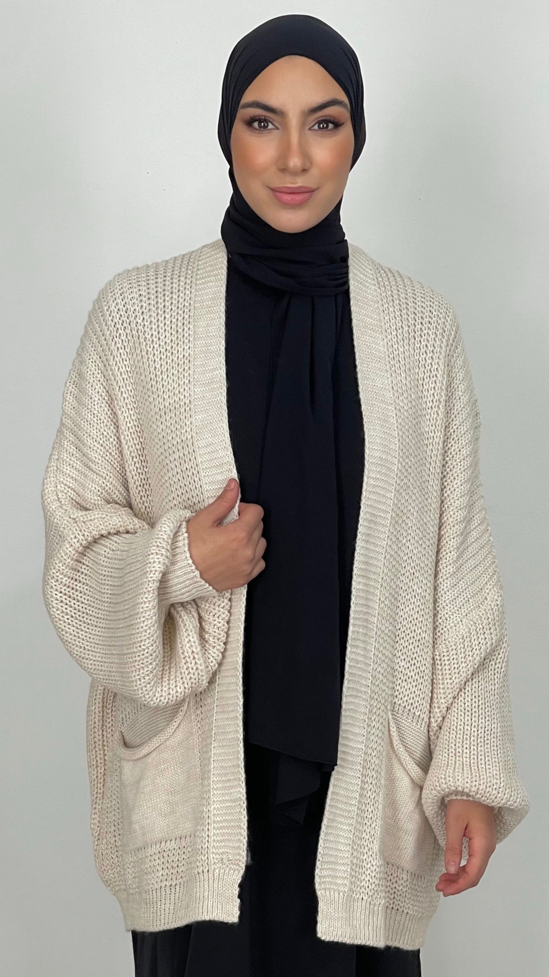 Cardigan corto con maniche lunghe