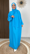 Load image into Gallery viewer, Abito preghiera, donna islamica, cuffia bianche, sorriso, tacchi bianchi, vestito lungo, velo attaccato al vestito, azzurro, Hijab Paradise
