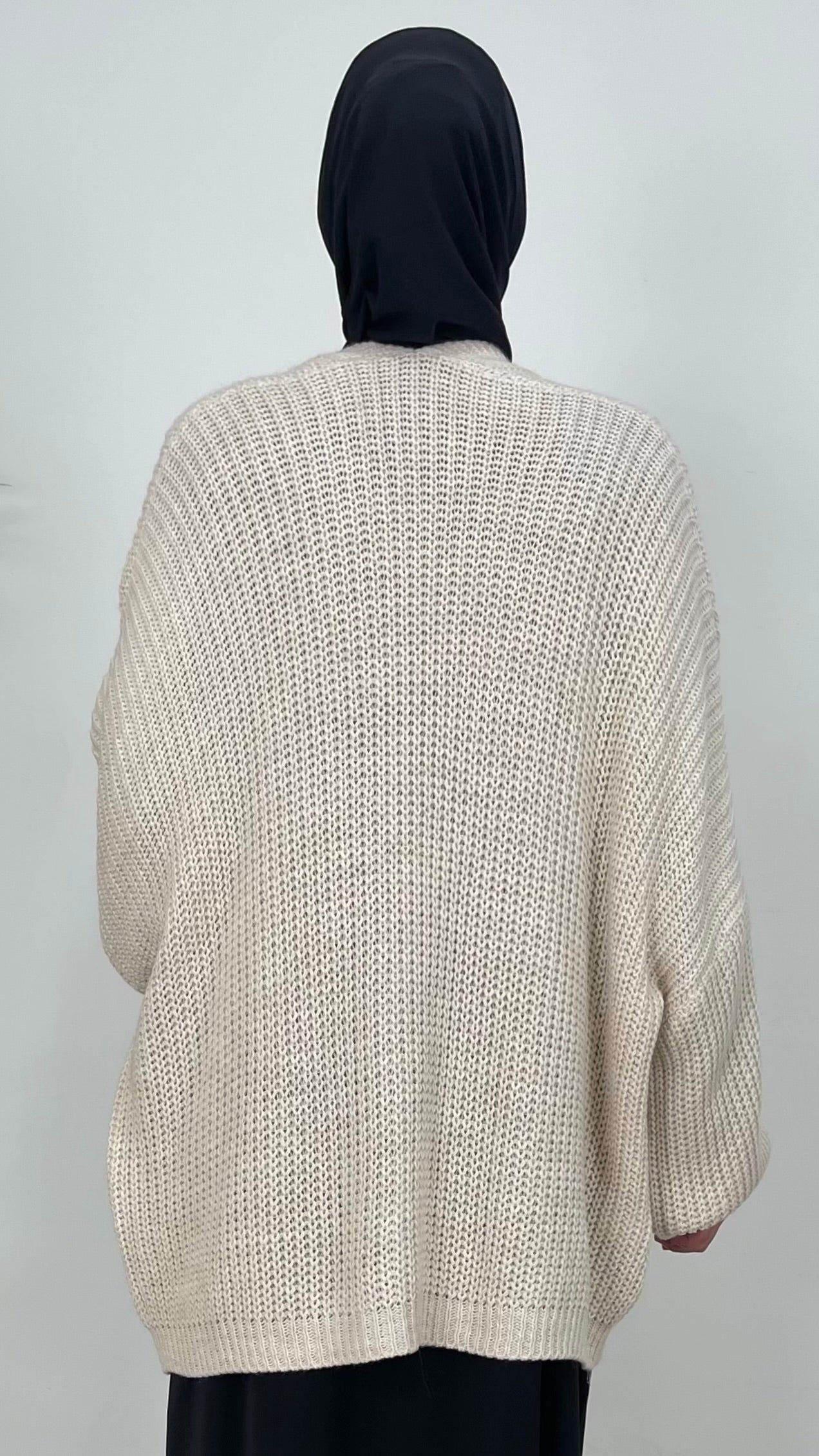 Cardigan corto con maniche lunghe