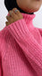 Maglione rosa barbie
