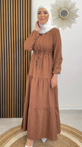Load image into Gallery viewer, Honeyed Dress marrone - dress - vestito con taglio a campana  - polsi arricciati - laccio in vita , jersey bianco- tacchi bianchi - sorriso- donna musulmane 

