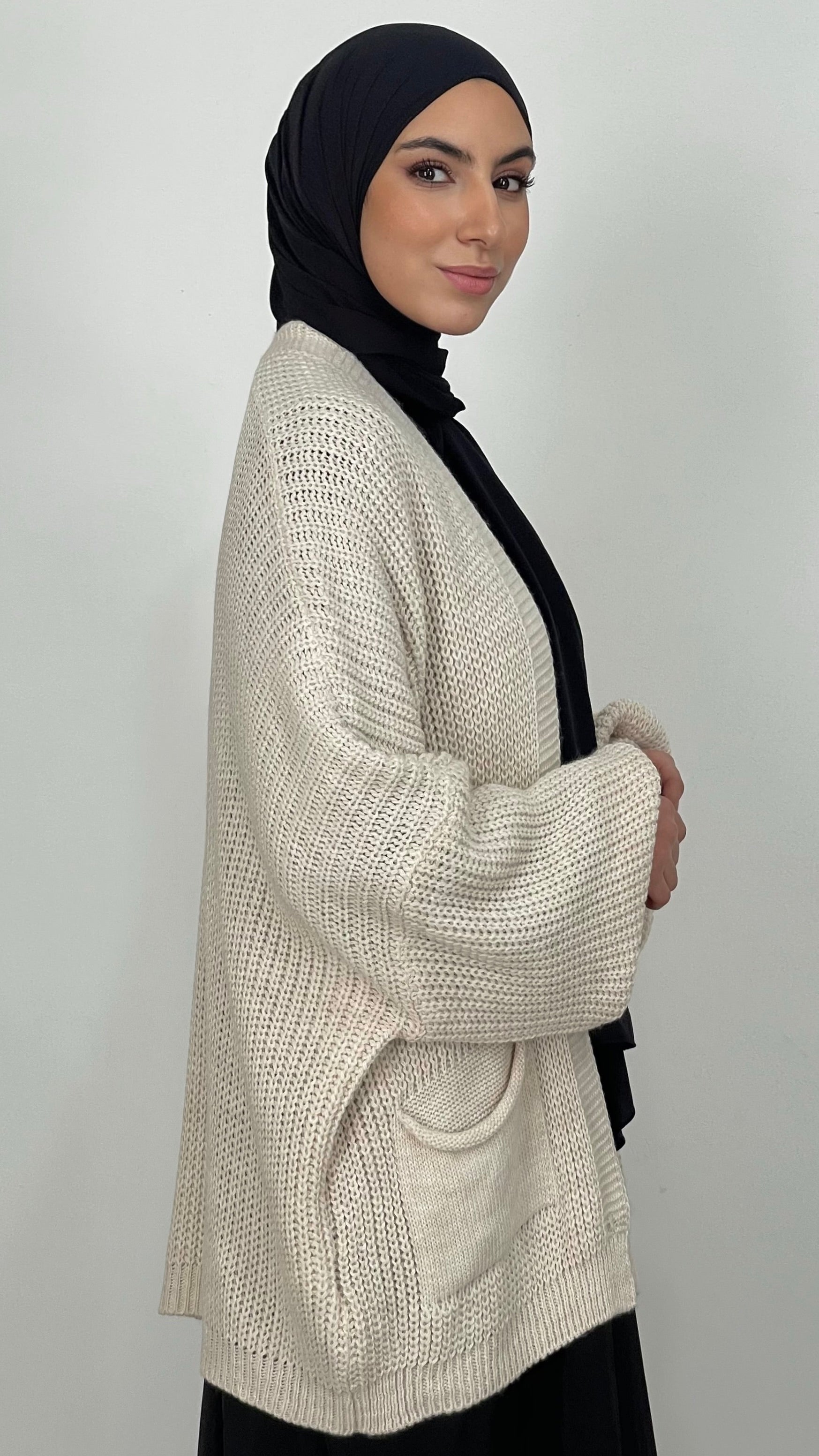 Cardigan corto con maniche lunghe