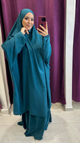 Load image into Gallery viewer, Abito preghiera, gonna, donna islamica, cuffia bianche, sorriso, vestito lungo, velo khimar, copricapo, jilbab , ciano.Hijab Paradise
